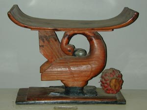 An Akan stool carved with the popular motif Sankofa